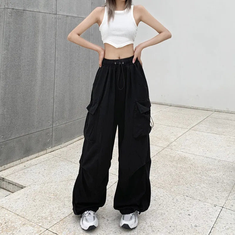https://womens-fashion-designer.com/cdn/shop/files/womens-draw-string-fashion-designer-cargo-wide-leg-pants-womens-fashion-designer-leggings-pants-womens-fashion-designer-plus-size-clothes-8.webp?v=1709006448